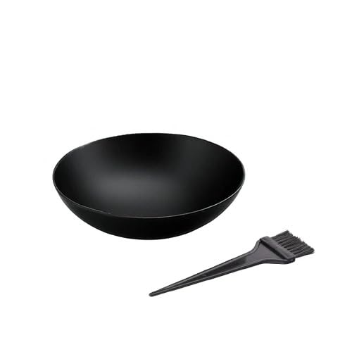 Traditional loha katori used for preparing herbal Ayurvedic hair masks