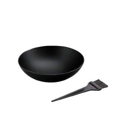 Traditional loha katori used for preparing herbal Ayurvedic hair masks