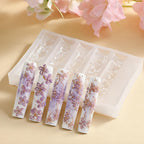 Full packaging view of the four piece Maycreate flower nail art template collection for salons.