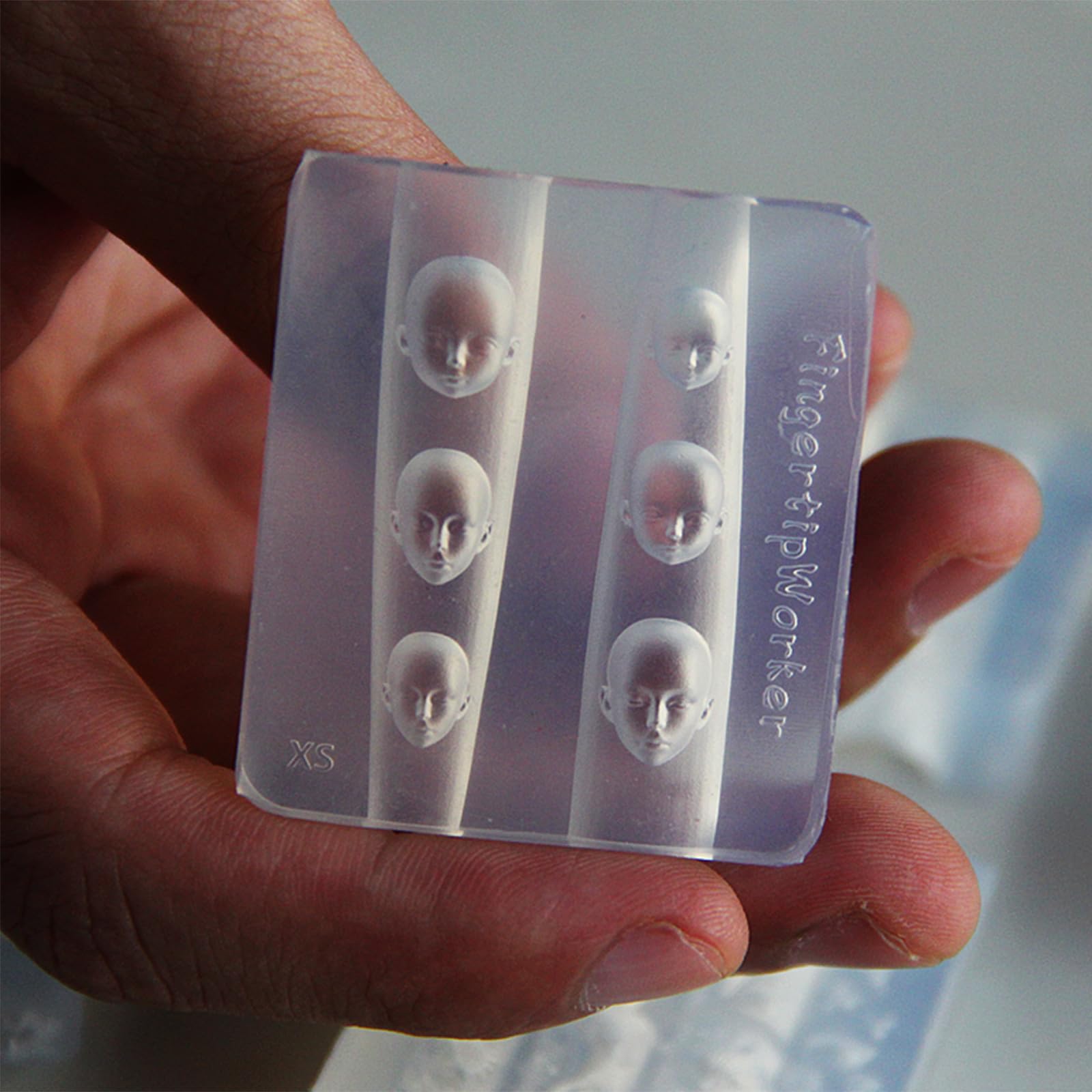 Close up of flexible silicone nail art stencil tool