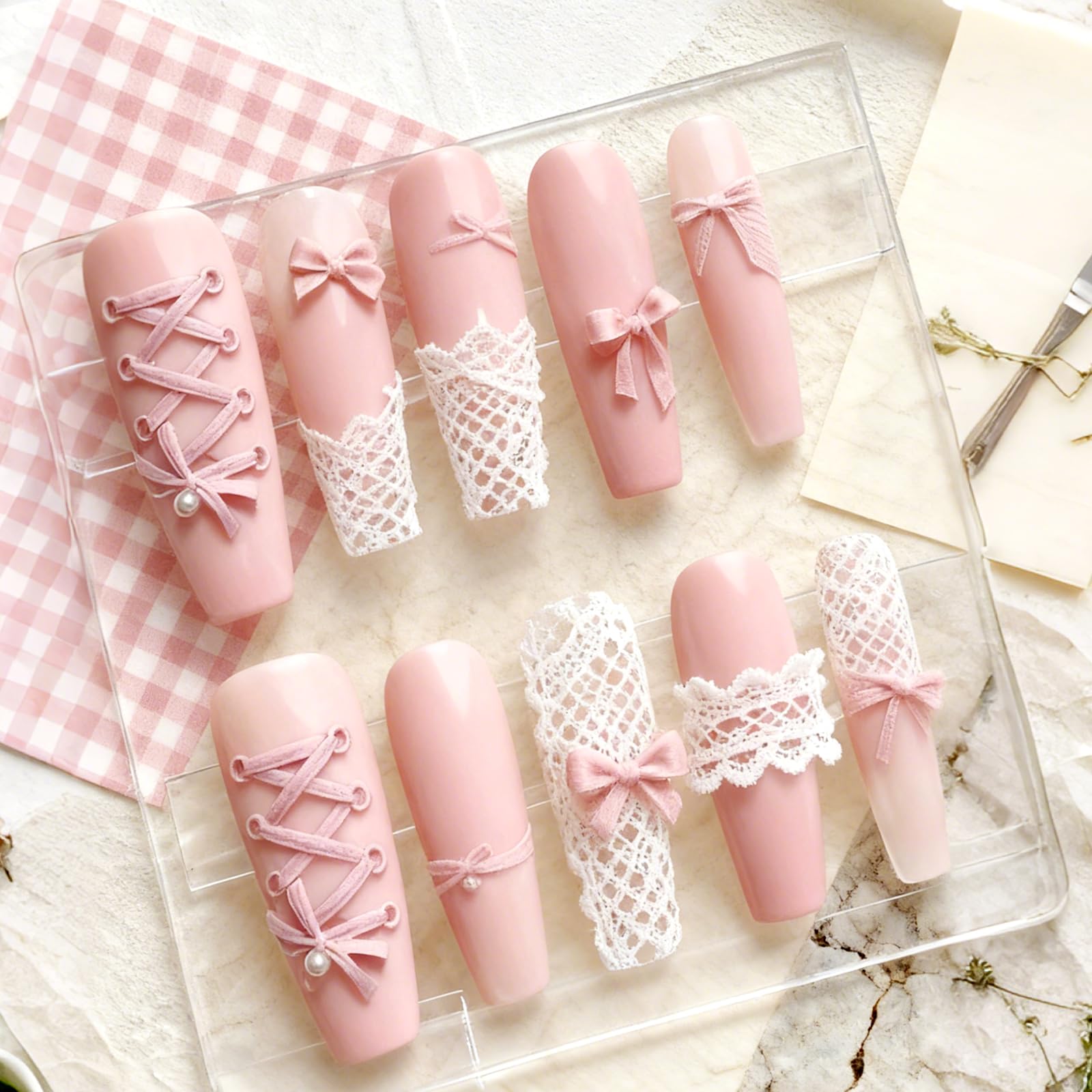 Demonstration of a flexible silicone nail mold being bent to easily release a cured 3D ribbon bow.