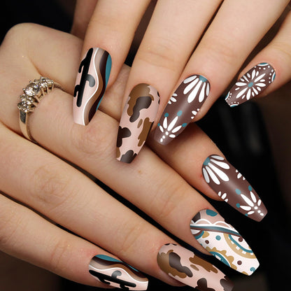 Whaline DIY manicure stamp templates arranged to display diverse western party designs