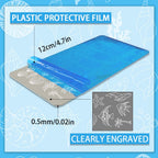 Stainless steel nail art templates featuring detailed mermaid and dolphin engravings close up view.