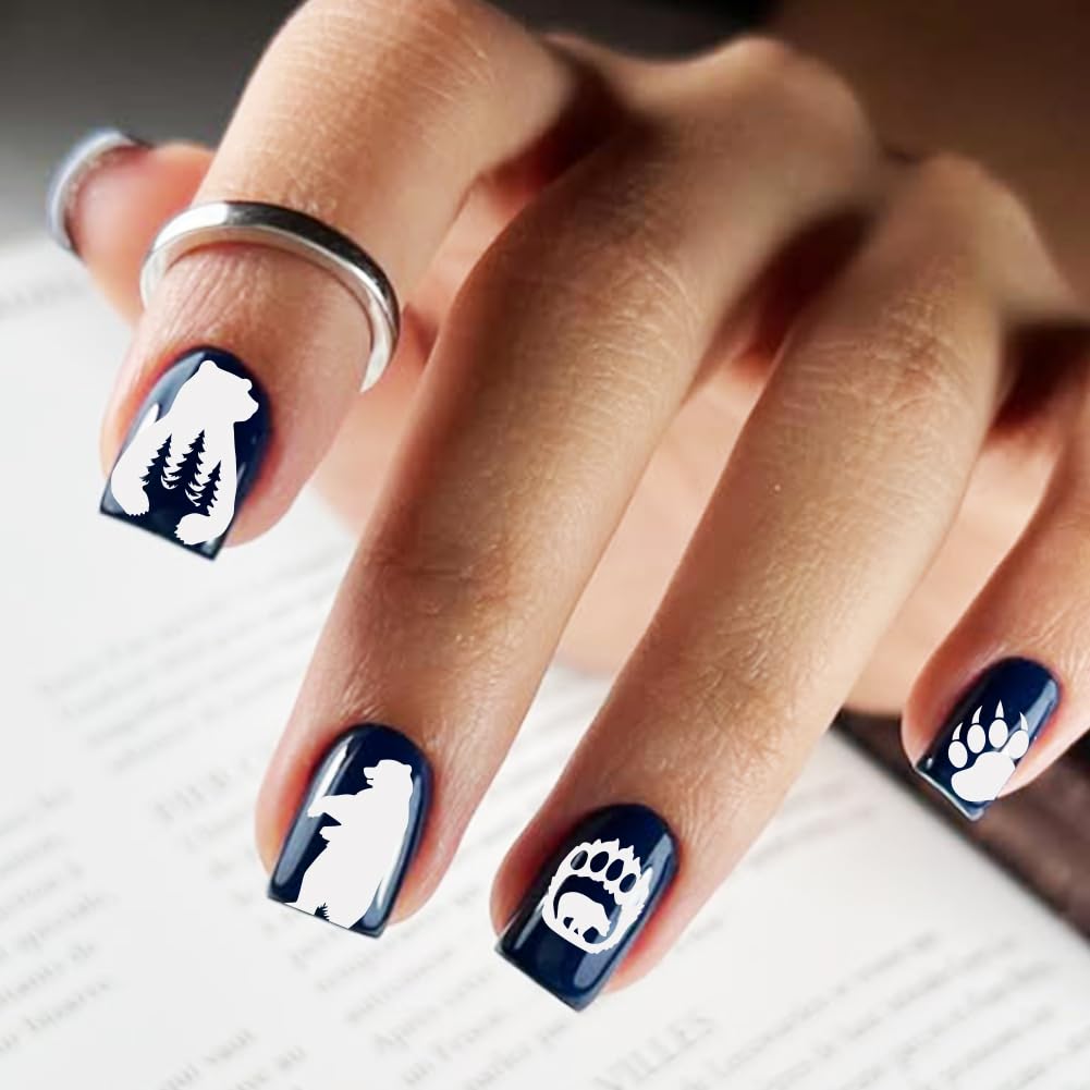 Artificial nails demonstrating wild animal print designs using stamping technique