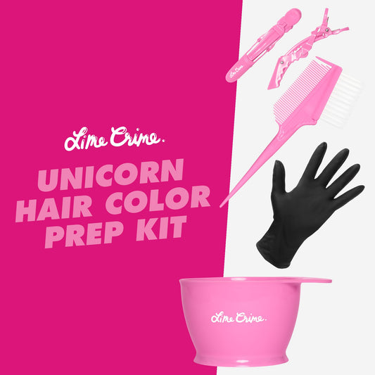 Close up of the Lime Crime professional hair coloring set components including pink alligator clips and black gloves.