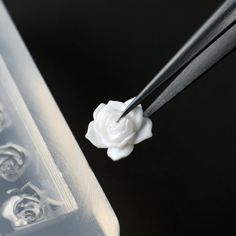 Flexible silicone material of Lifoost nail carving mold being bent for easy charm removal