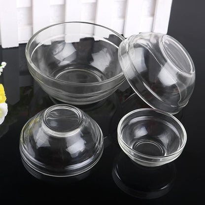 Luzen transparent essential oil and face mask preparation bowls arranged on a salon spa counter.