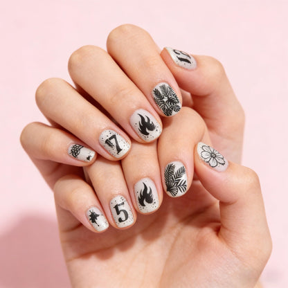 Three stainless steel nail art template plates with diverse patterns