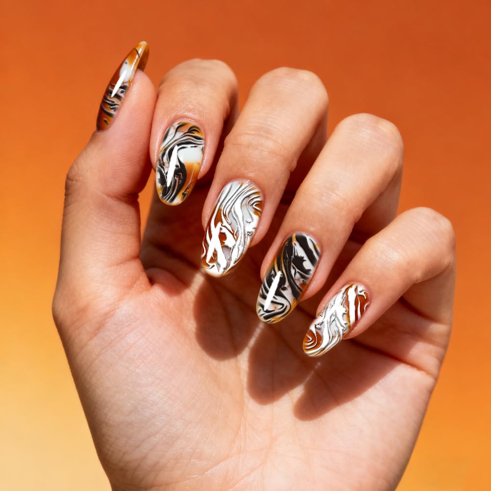 Four pieces of geometric ripple pattern stamping templates for salon quality DIY manicures.