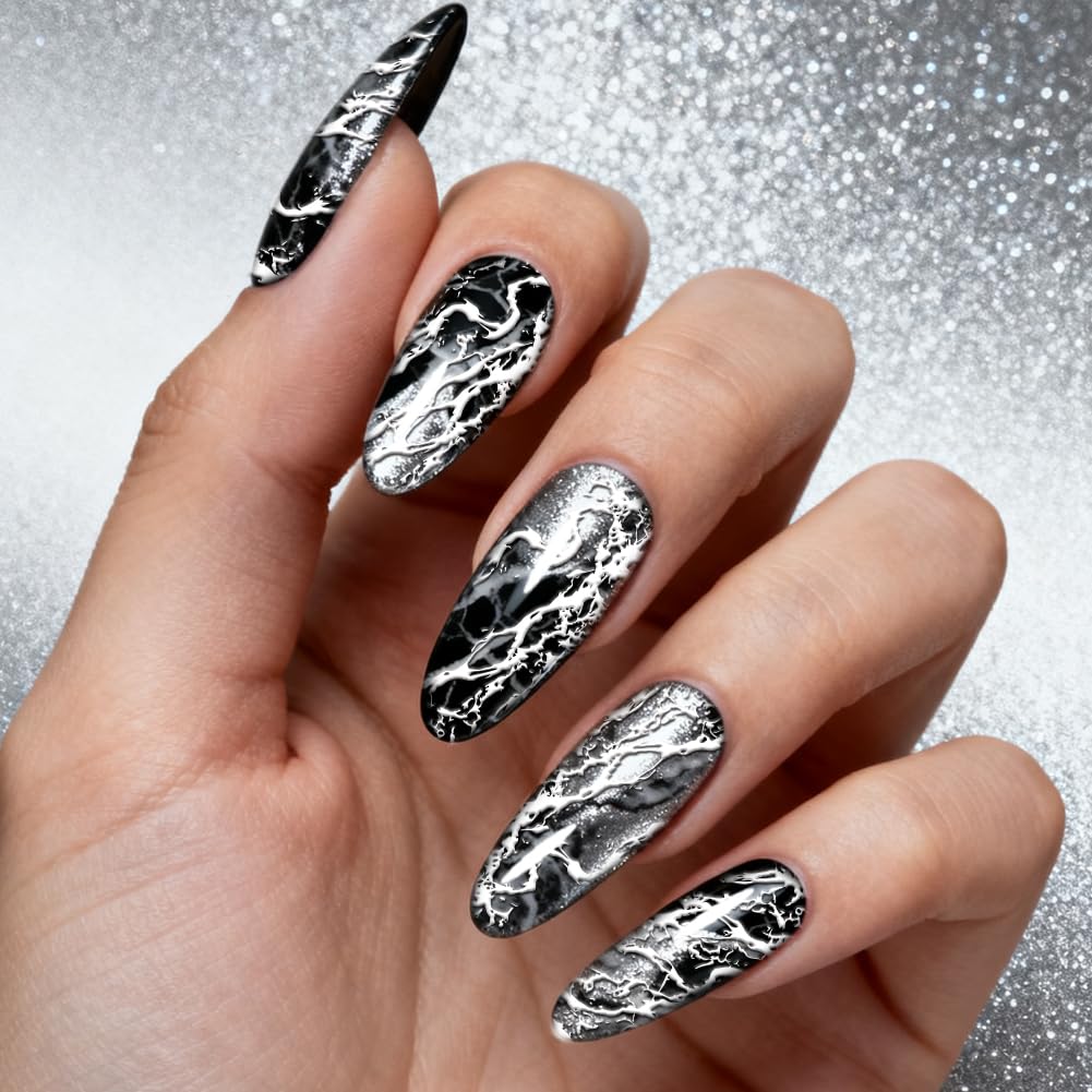 Detailed view of the precise etching on the abstract marble vein nail transfer plates.