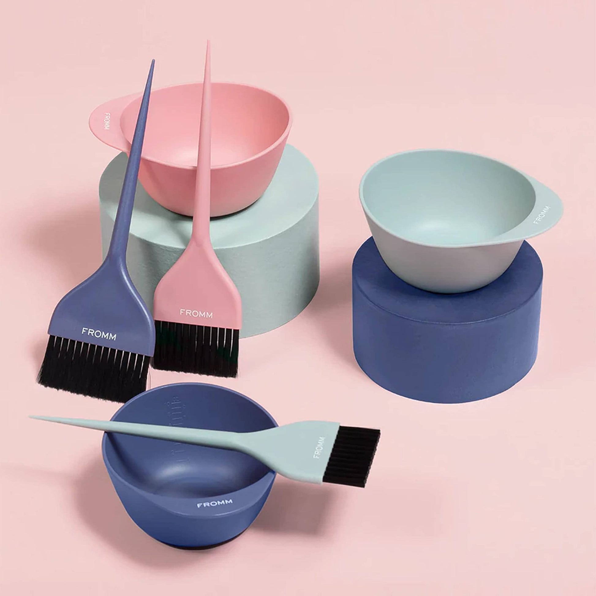 Stackable design demonstration of the three piece Fromm hair color mixing bowls.