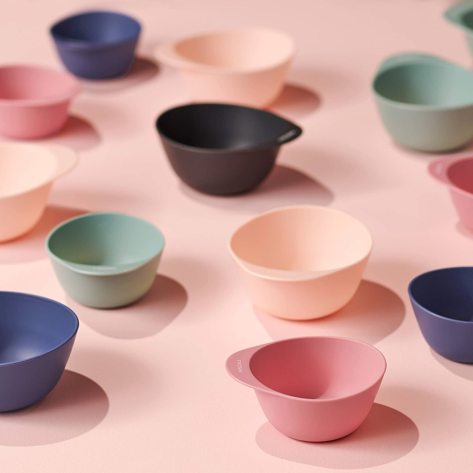 Fromm ten ounce capacity plastic bowl with a stain proof matte finish.