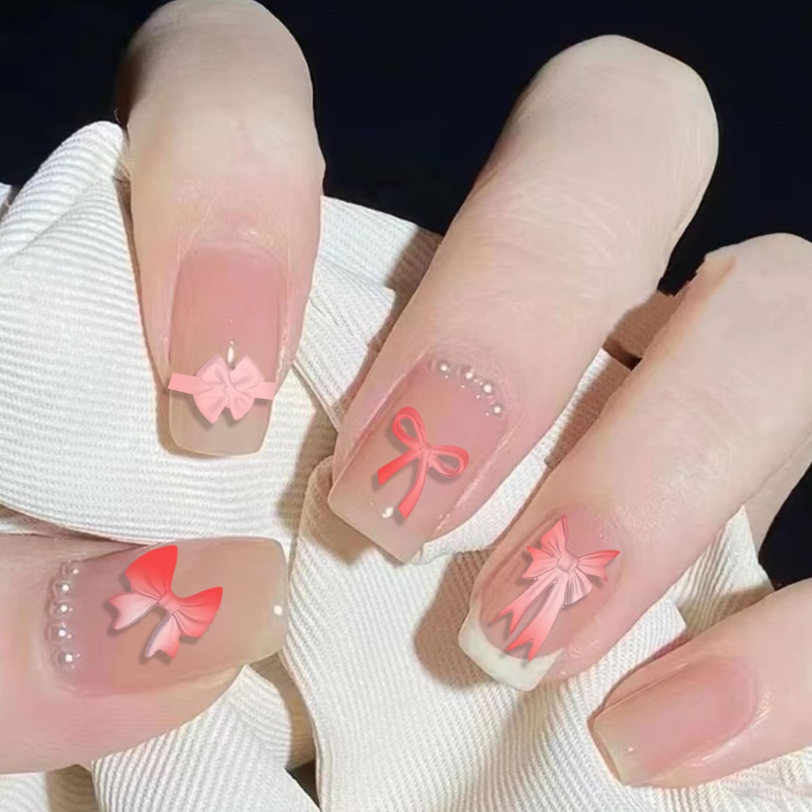 Demonstration of filling the transparent bow nail mould with gel polish using a tool.