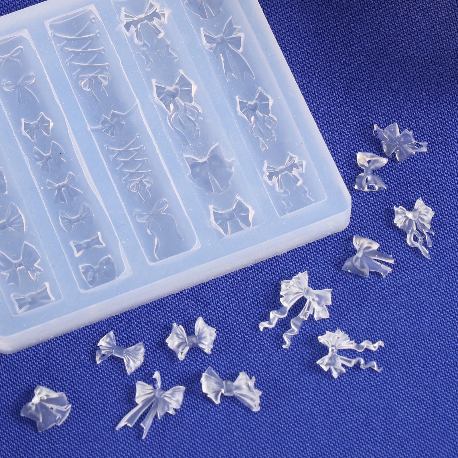 Close up view of the twenty baby bow and ribbon engraving patterns on the clear stencil.
