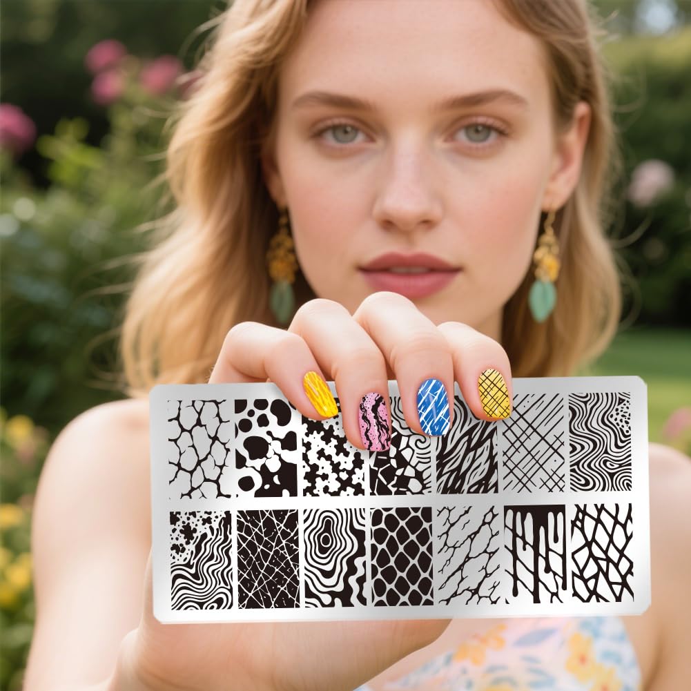 Side perspective of the premium stainless steel nail stamping plates highlighting the deep abstract etchings.