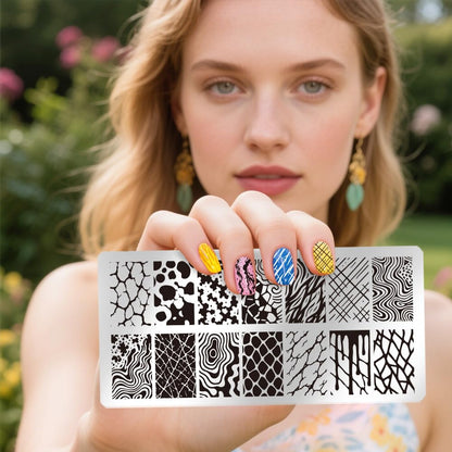 Side perspective of the premium stainless steel nail stamping plates highlighting the deep abstract etchings.