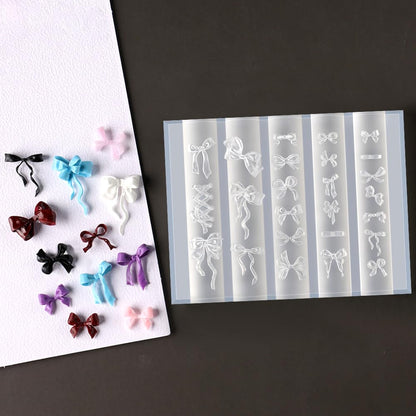 Detailed close up of the tiny bow designs on the WENEWFINE reusable nail template