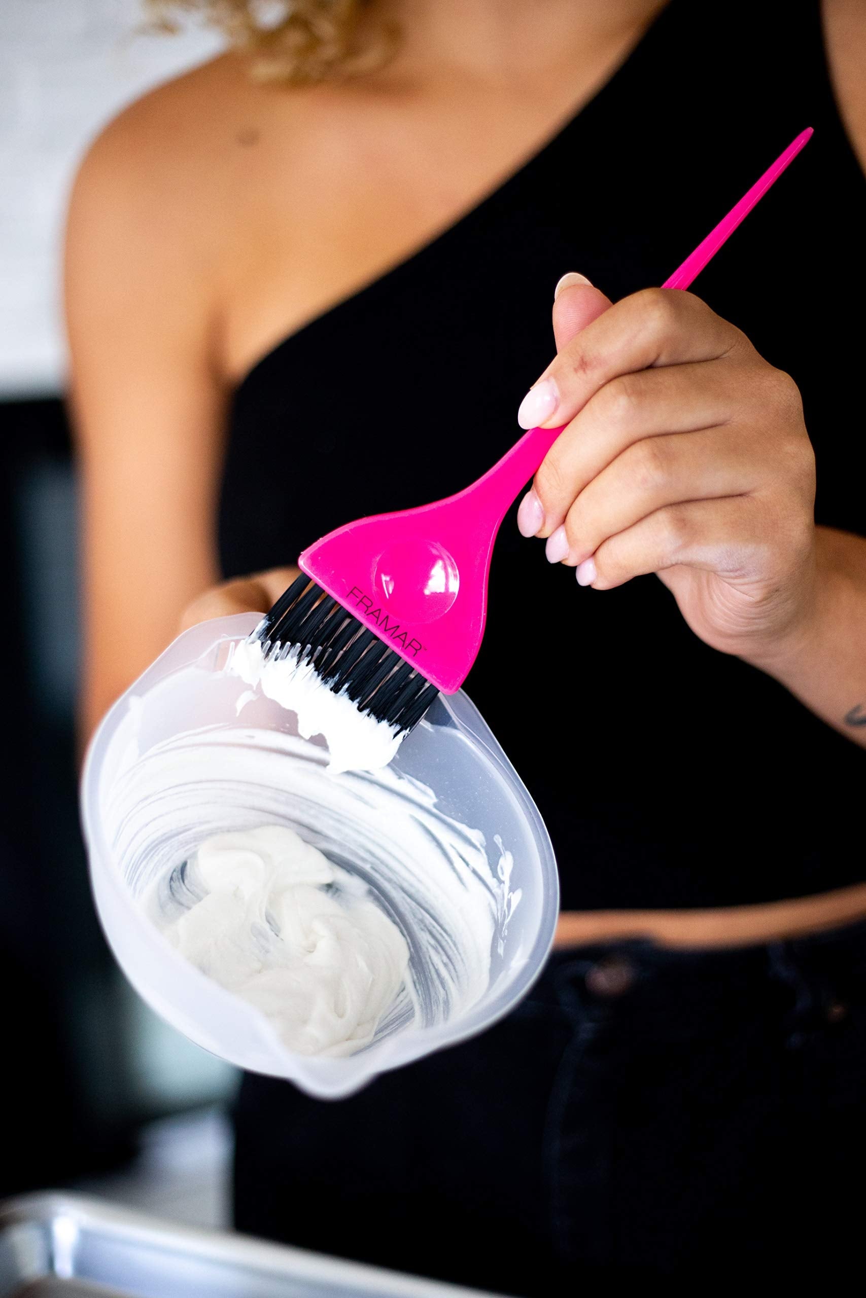 Two pack of Framar color mixing bowls placed flat on a salon workstation scale.