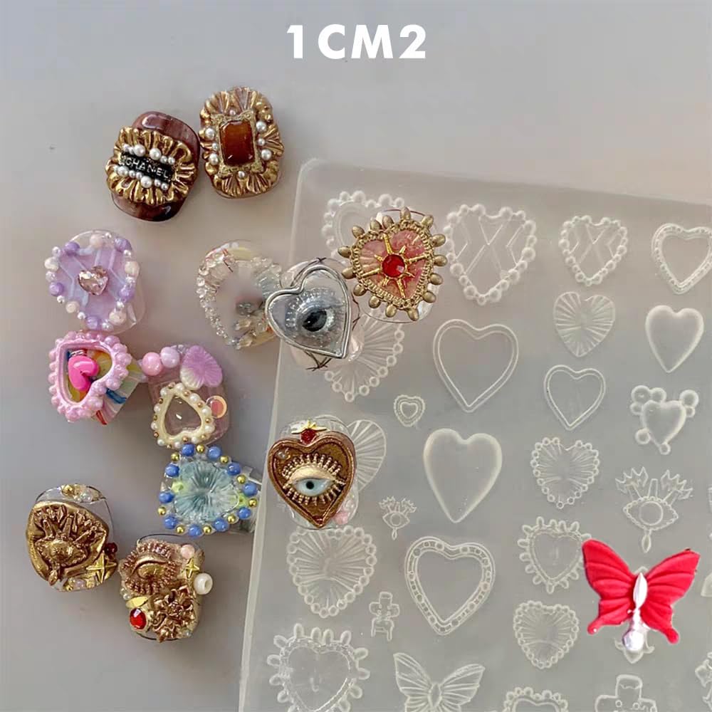 Close up of clear 3D gel nail art sculpture mold featuring European vintage baroque designs for custom resin charm creation