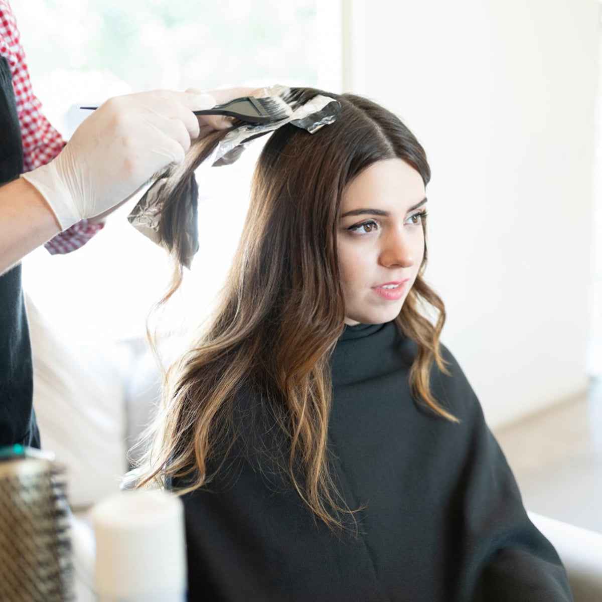 Svjetiq flexible silicone hair color mixing bowl shown in its folded and expanded states.