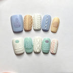 Side angle view of the flexible reusable 3D nail stencil mold showing deep texture cavities.