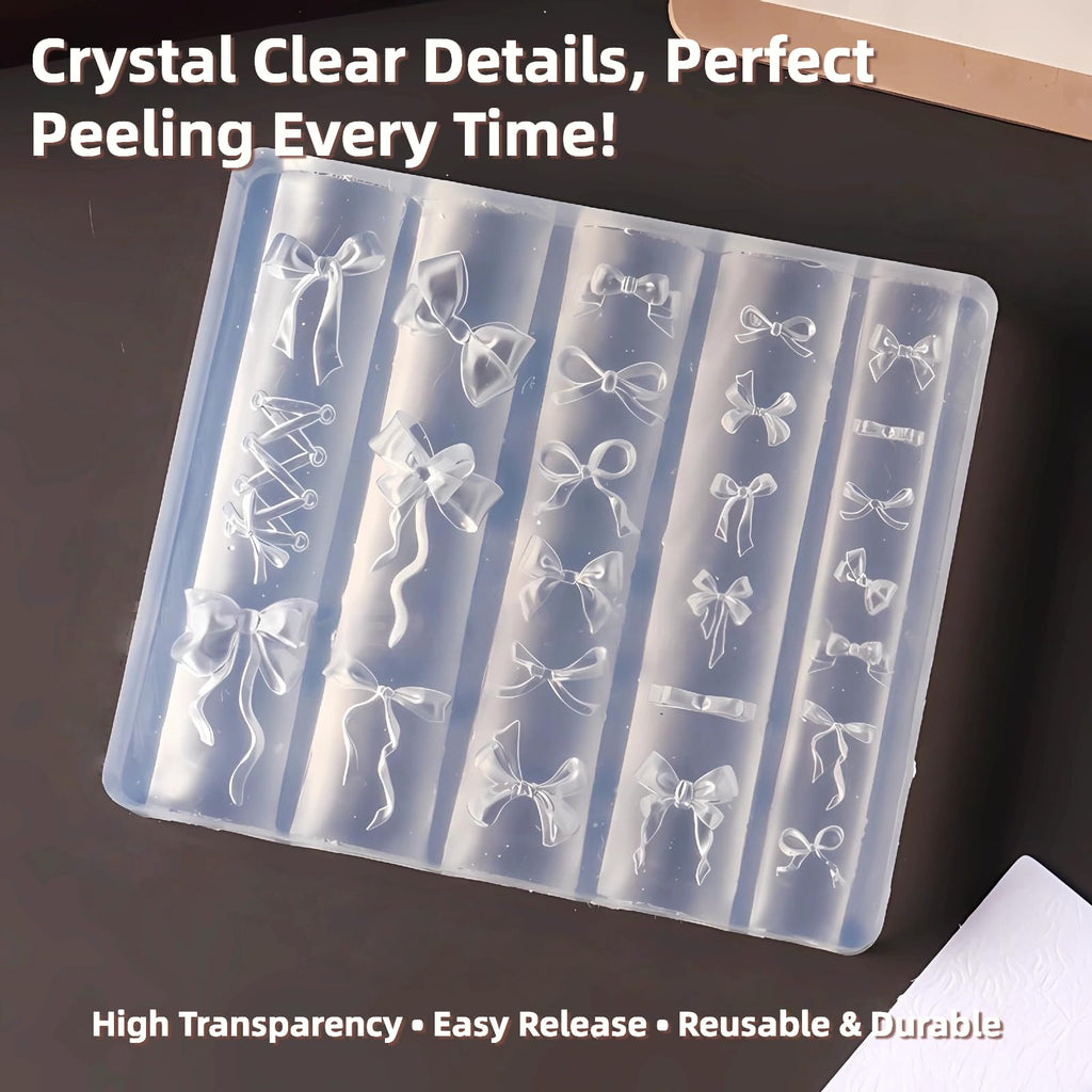 Close up view of translucent silicone nail charm carving mold featuring detailed romantic bows.