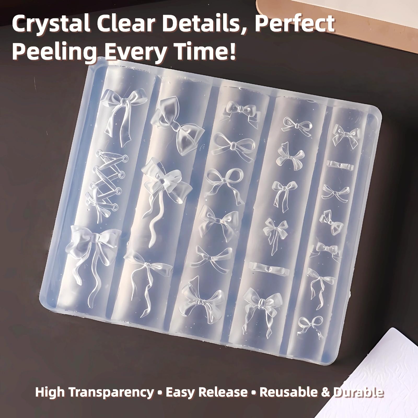 Close up view of translucent silicone nail charm carving mold featuring detailed romantic bows.