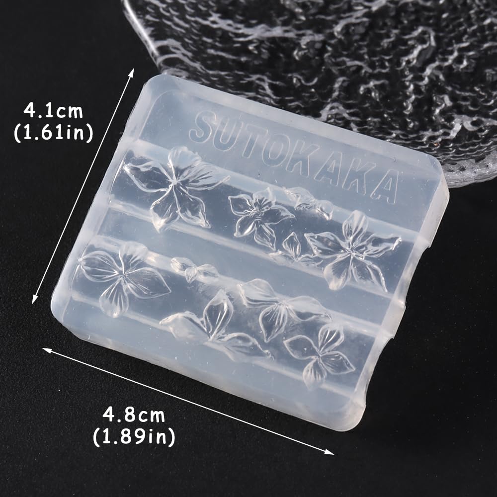 Flexible transparent silicone manicure tool being flexed to demonstrate easy demoulding