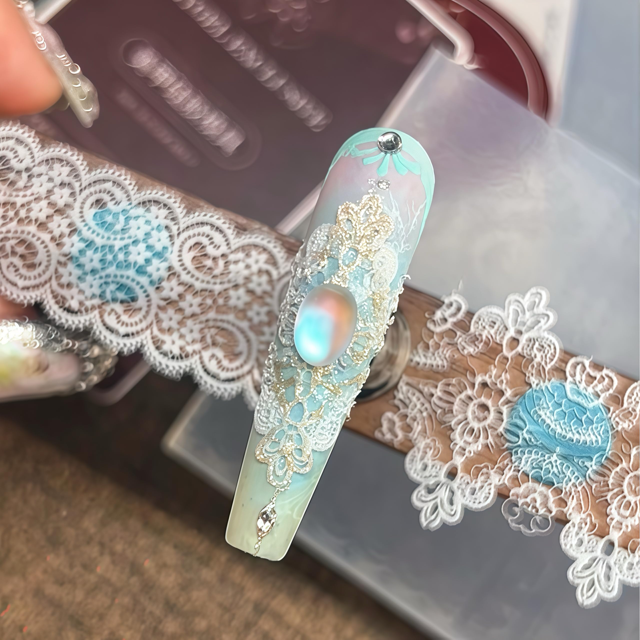 Top down look at the various vintage French lace and bow designs available on the BHCCXZ silicone tool