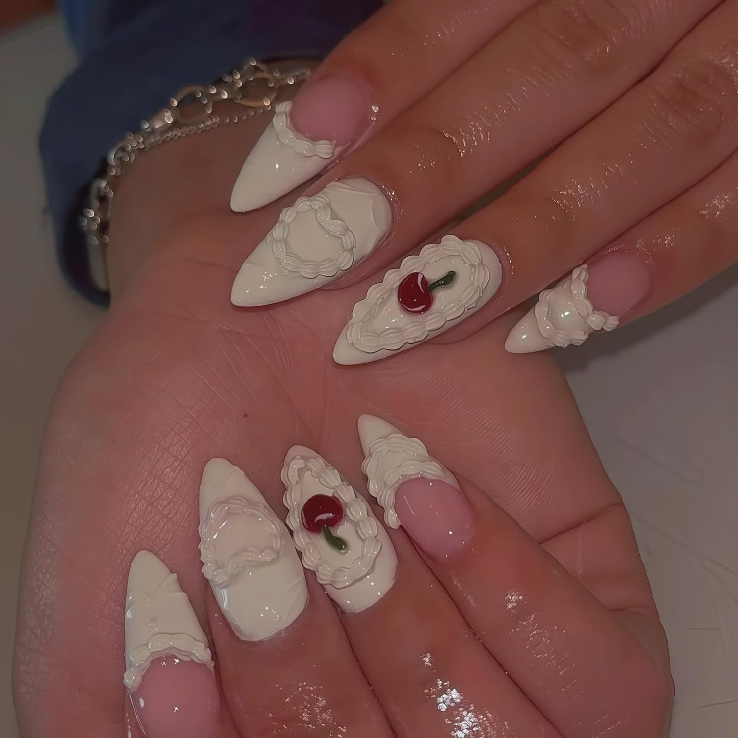 Gehaiwo professional nail charm template being used to craft custom acrylic gel overlays.