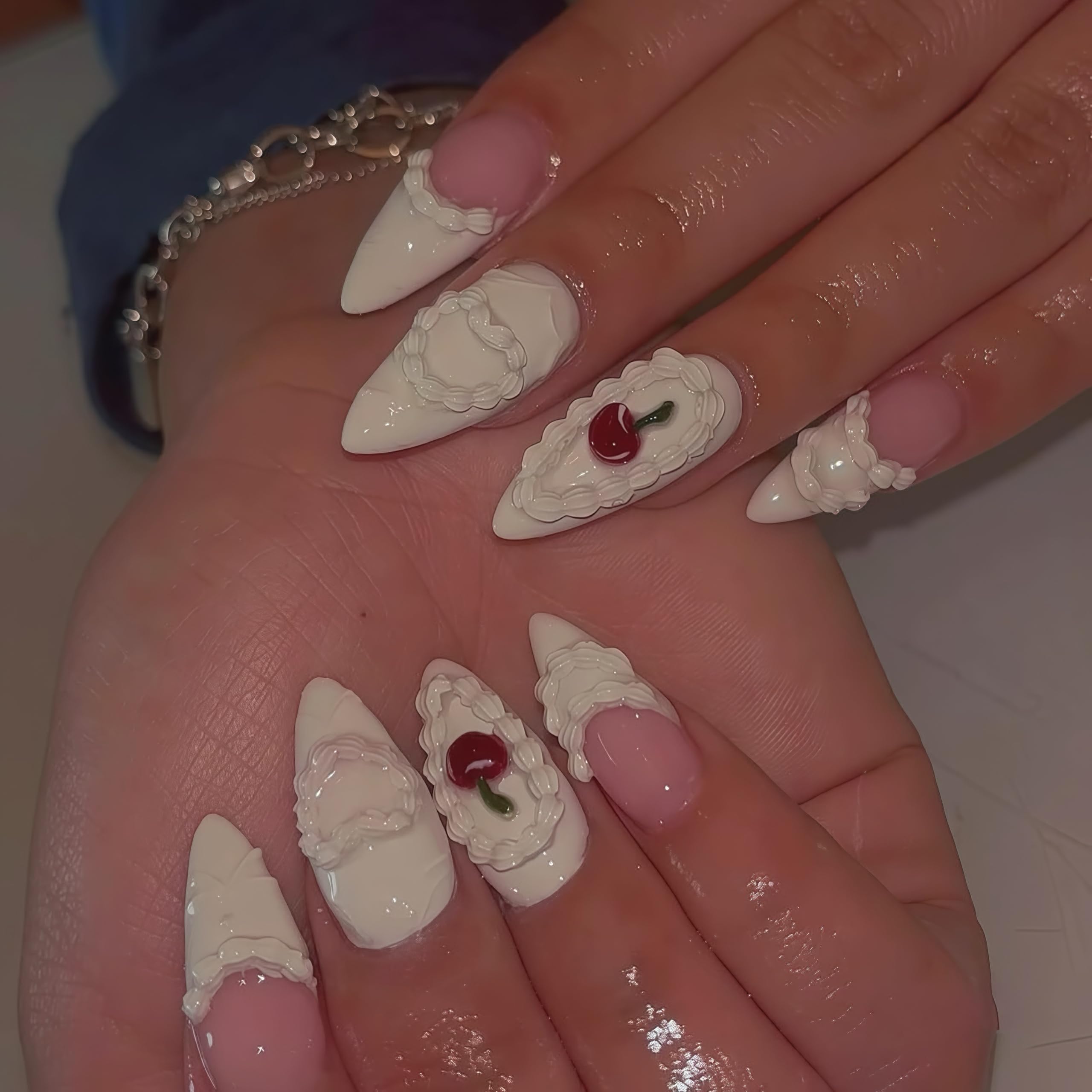 Gehaiwo professional nail charm template being used to craft custom acrylic gel overlays.