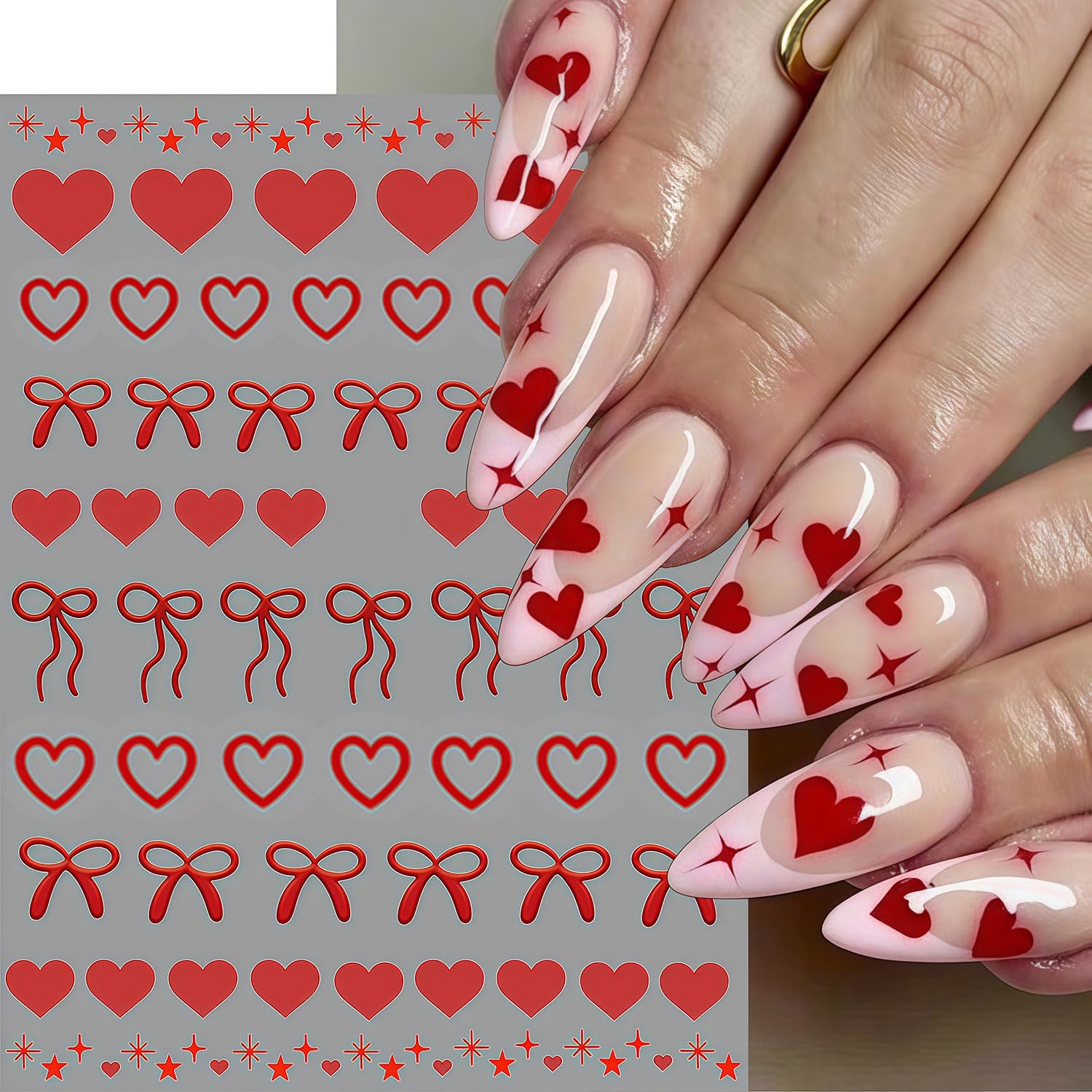 Close up of red and black heart nail art stickers