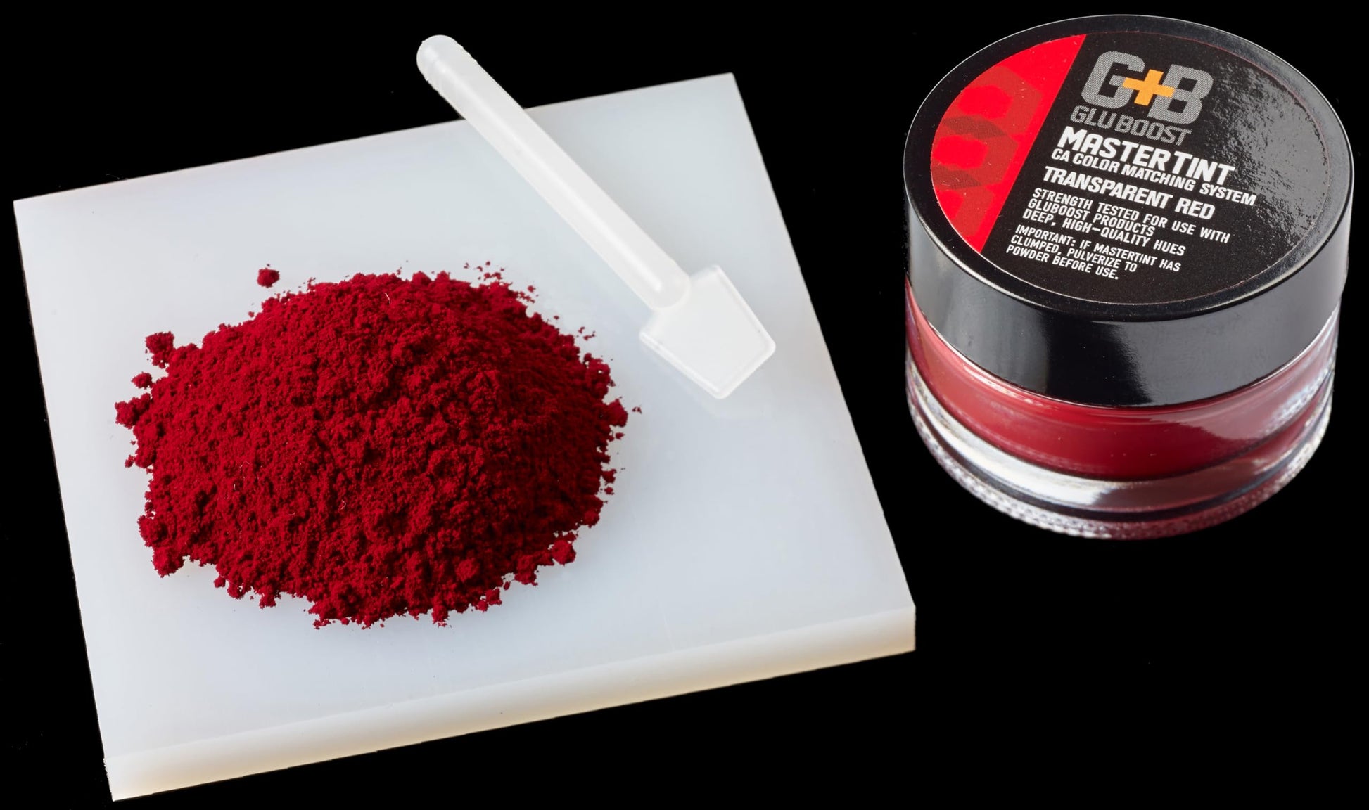 Professional color matching system jar demonstrating transparent red tone pigment properties.