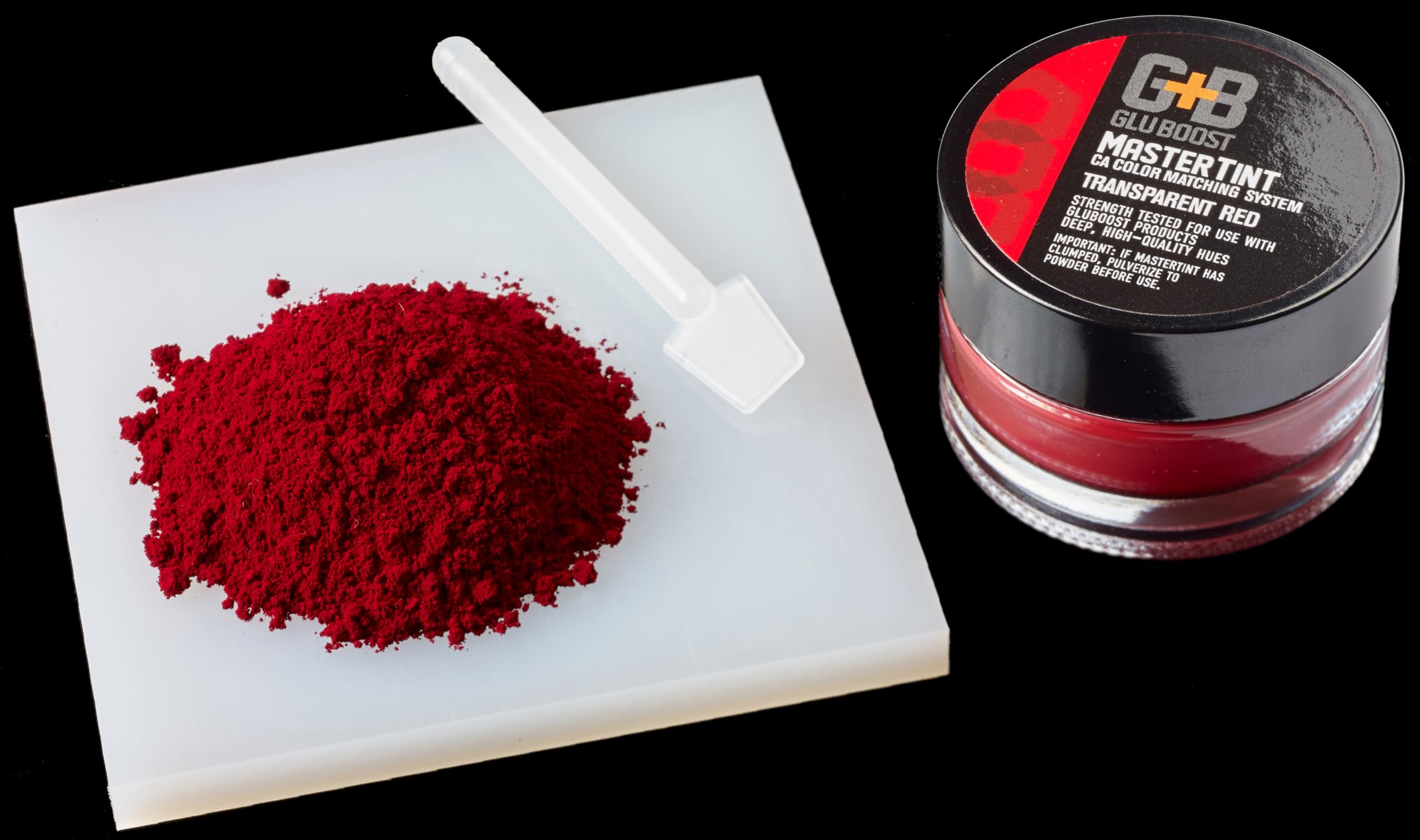 Professional color matching system jar demonstrating transparent red tone pigment properties.