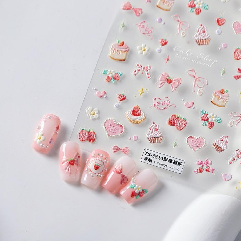 Close up of 5d raised strawberry and bow nail art decals