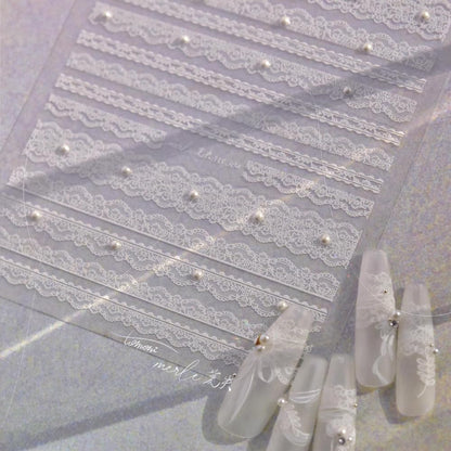 Detail shot of self-adhesive pearl and lace nail sticker sheet