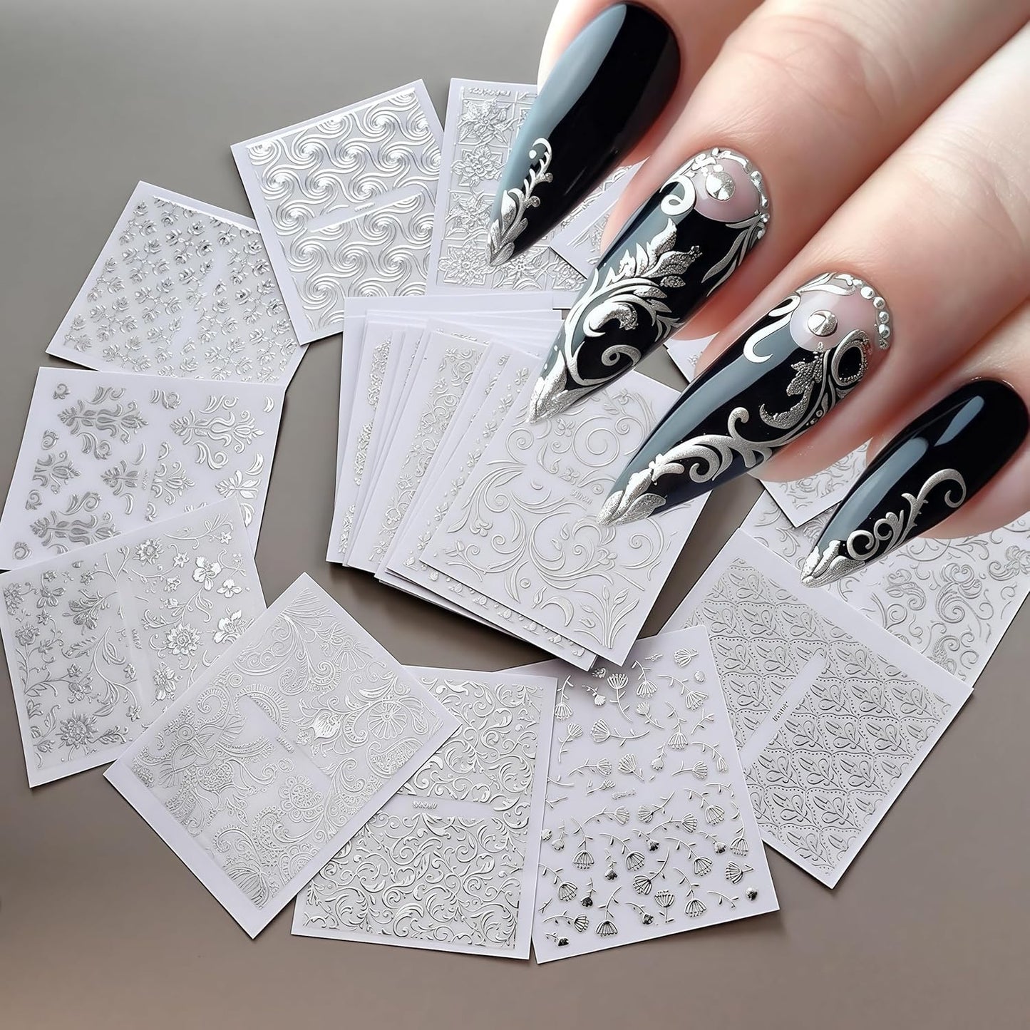 Close up of silver floral vine nail decals