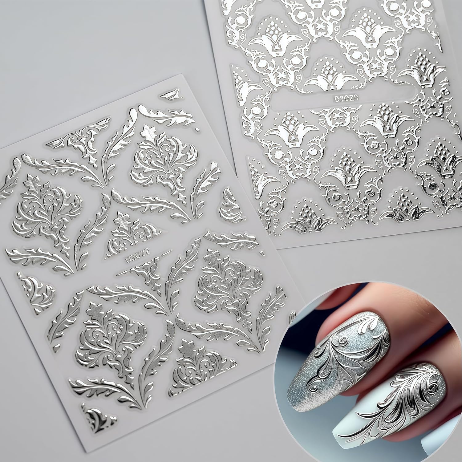 Model showing elegant manicure with silver lace stickers