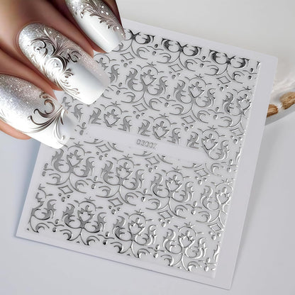 Thirty sheets of assorted silver nail art designs