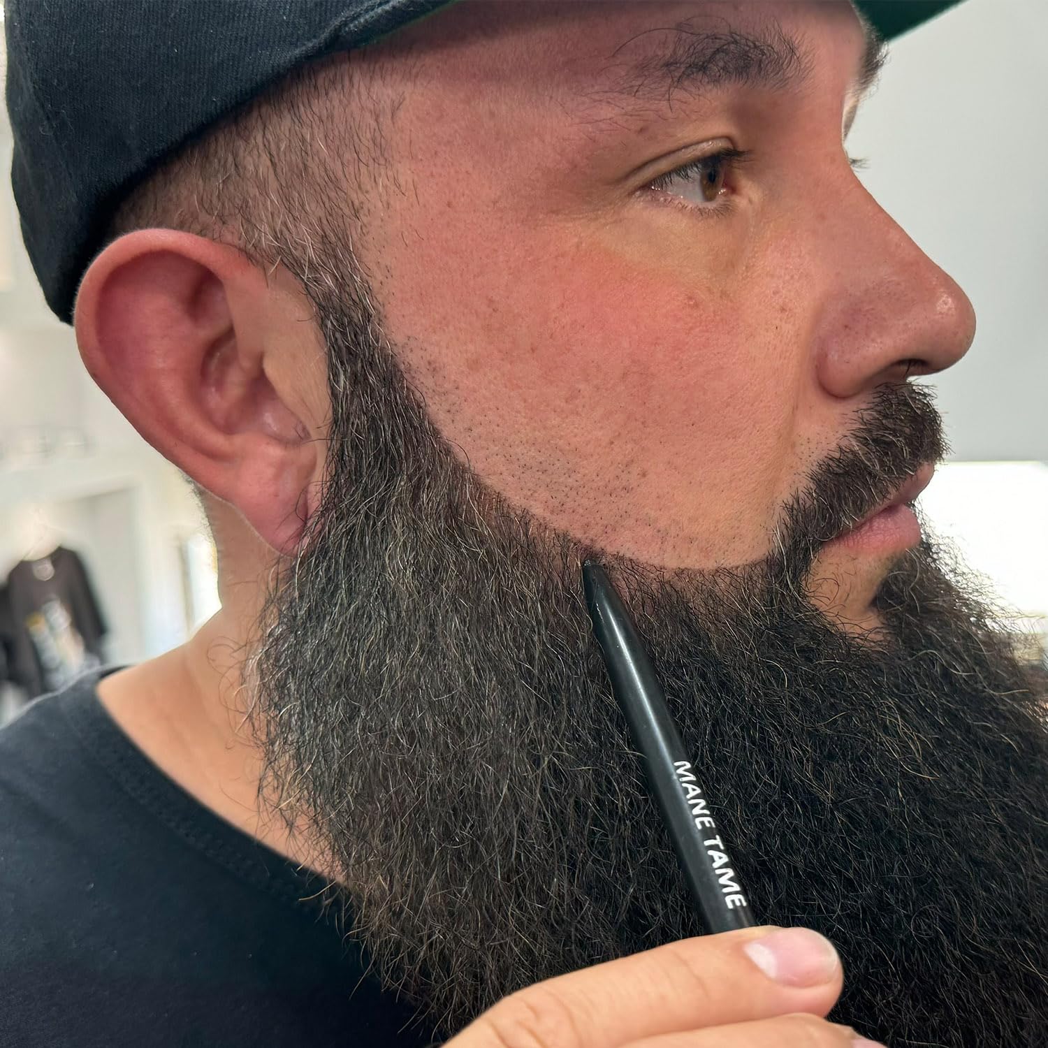 Mane Tame long lasting hairline and beard filler showing the eraser and sharpener end