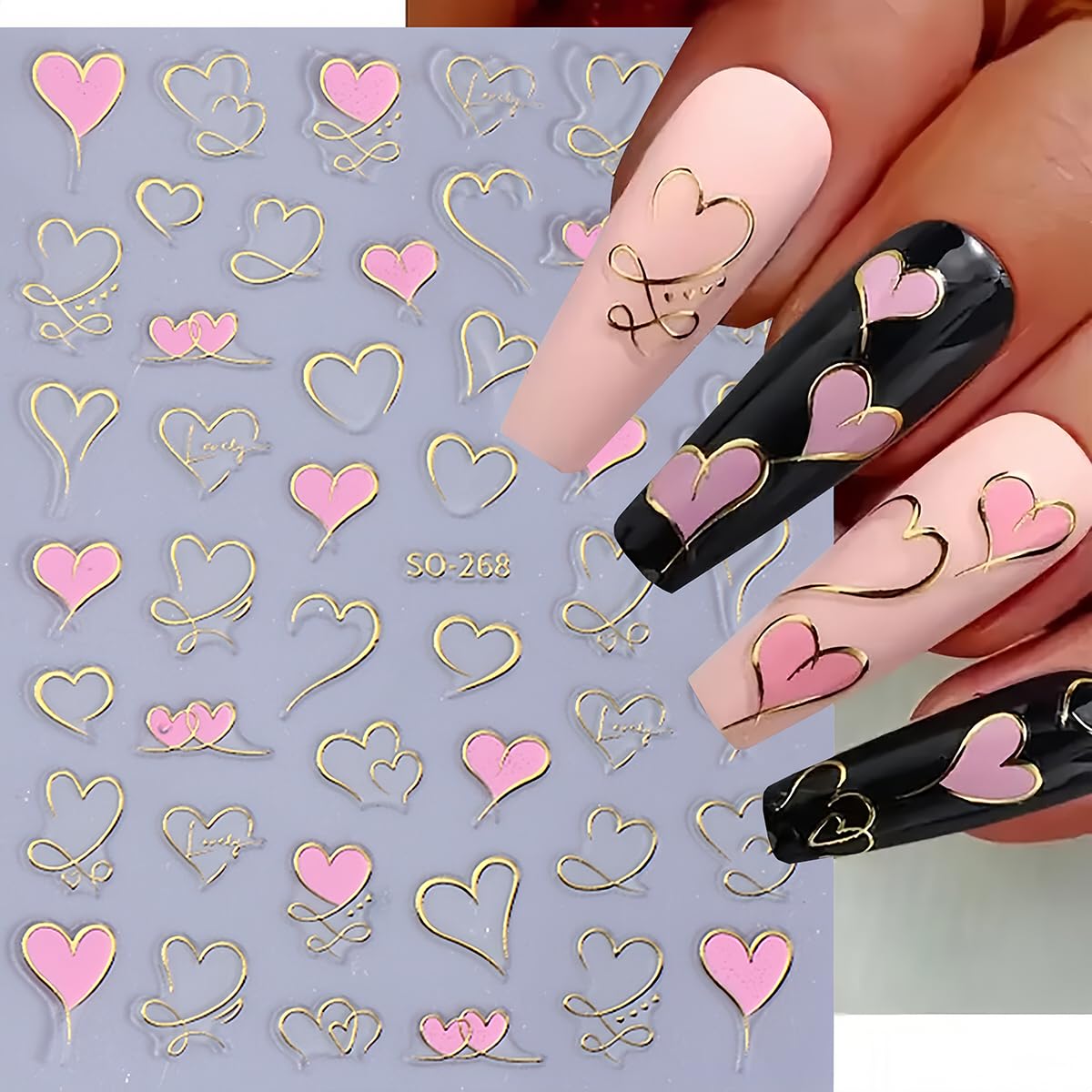 Close up of 3D red and pink heart nail decals on sheets