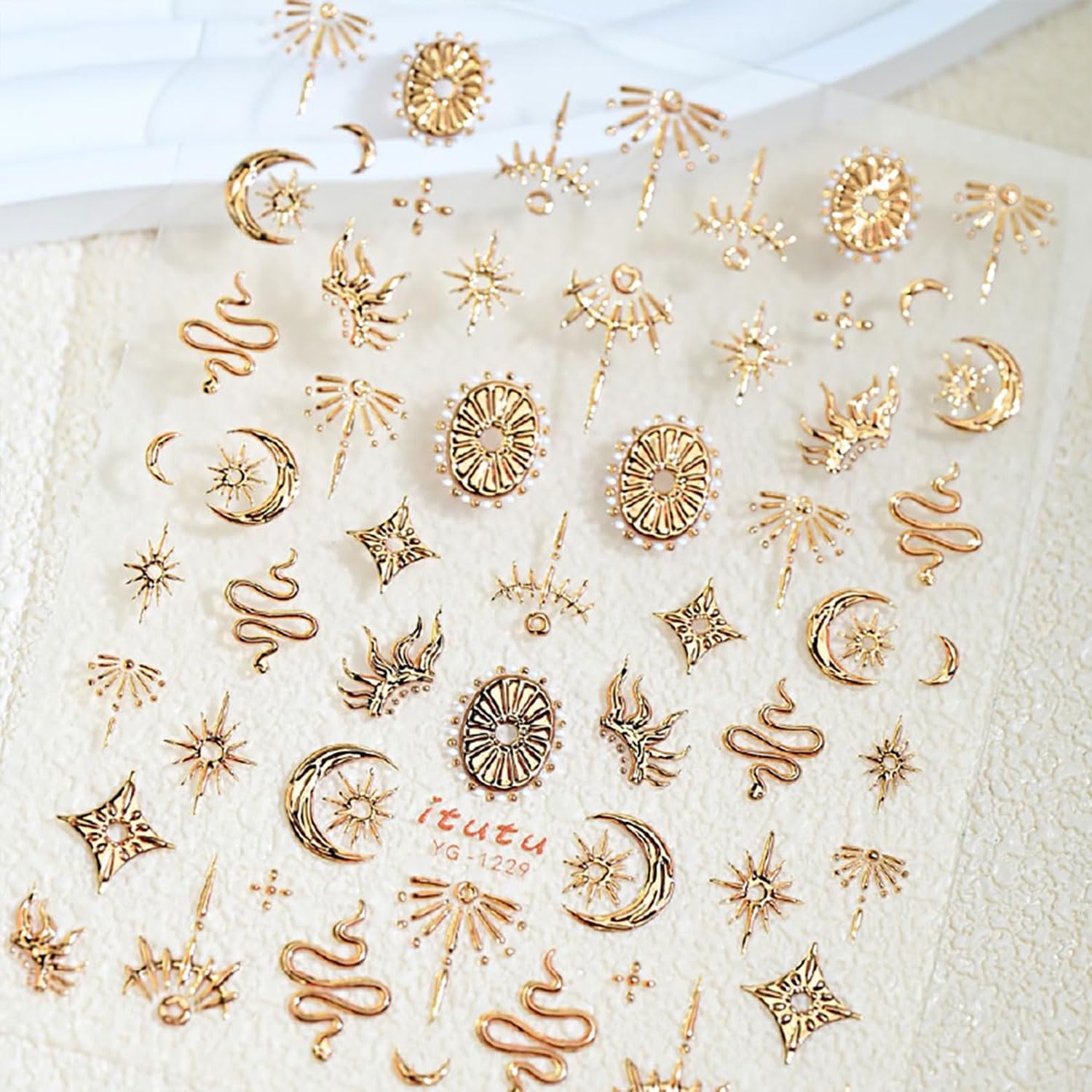 Detailed view of bronzing nail stickers for DIY manicure
