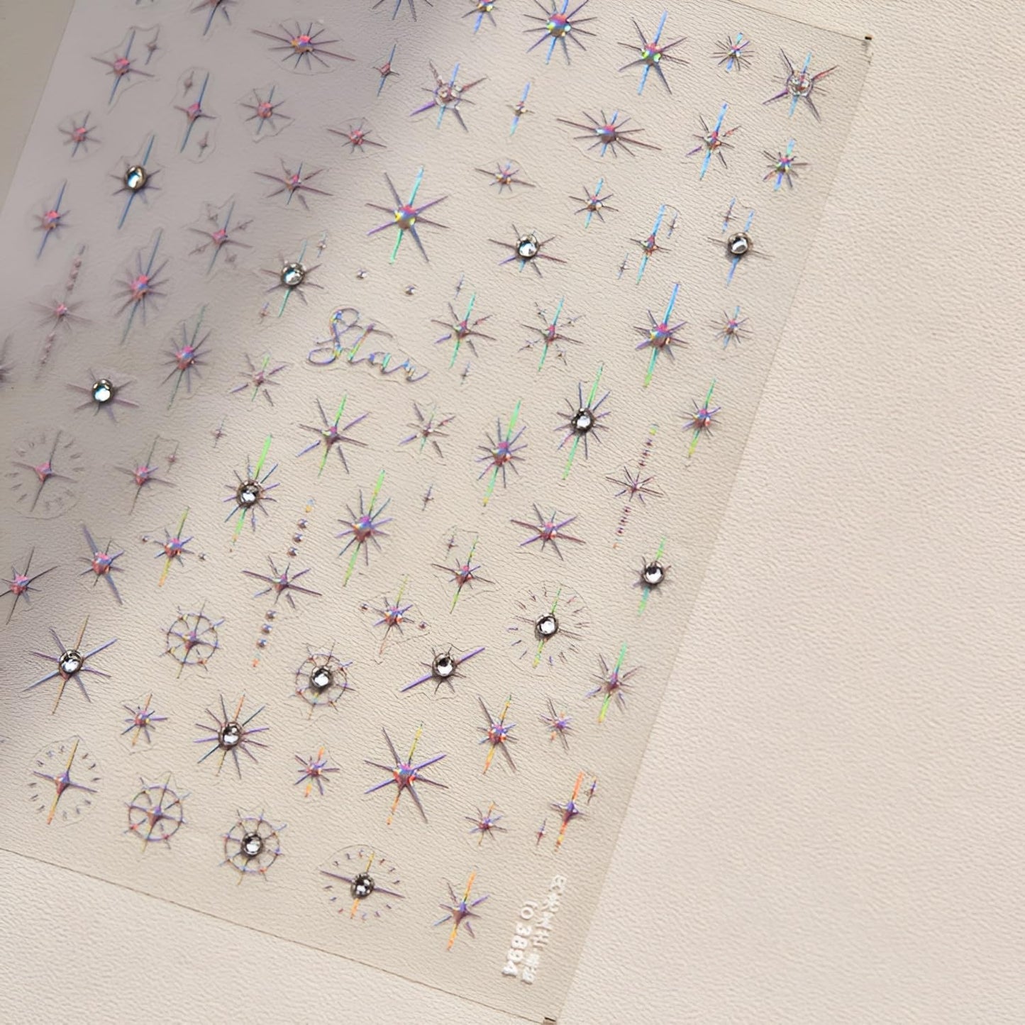Hand model displaying 5D star nail art stickers