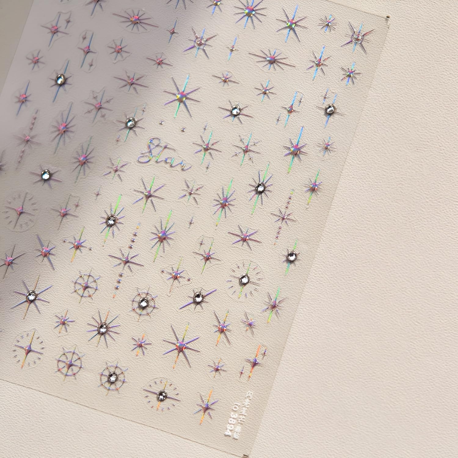 Hand model displaying 5D star nail art stickers