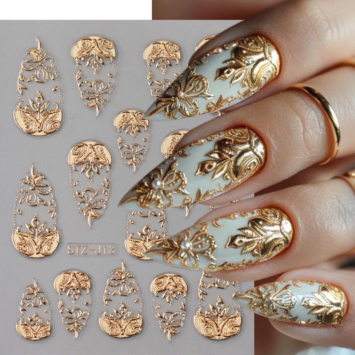 Metallic golden totem nail art sliders on a manicured hand