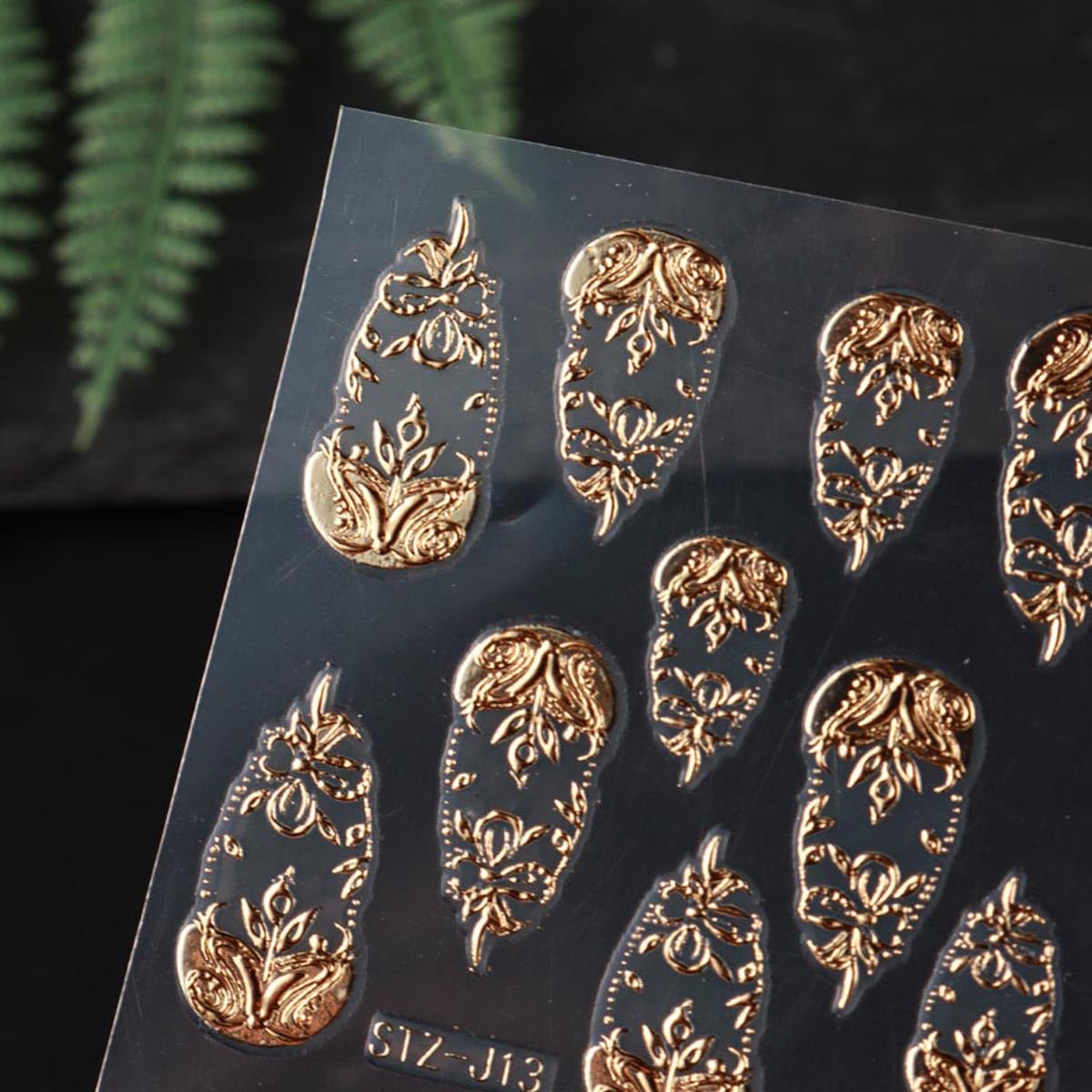 Detailed view of 5D carving quality gold nail art stickers