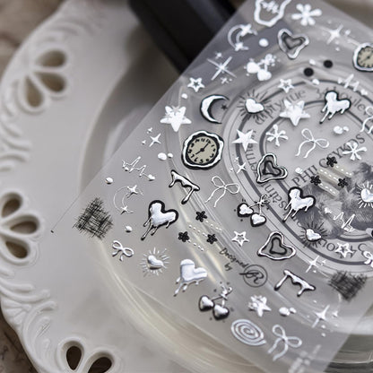 Close up of 5D embossed silver metal clock nail decals