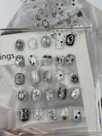 Demonstration of raised texture on silver star nail art stickers
