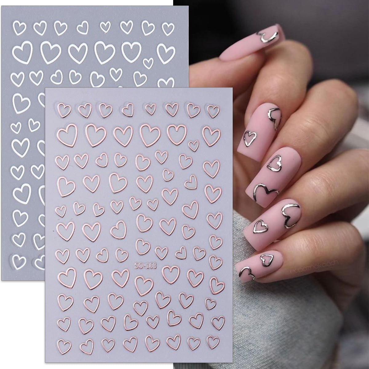 Detailed view of gold and silver heart nail decals