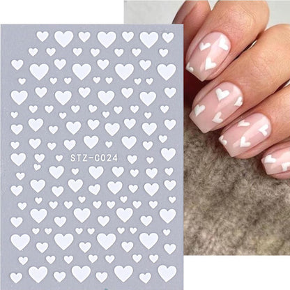 Applying self-adhesive nail stickers for DIY manicure